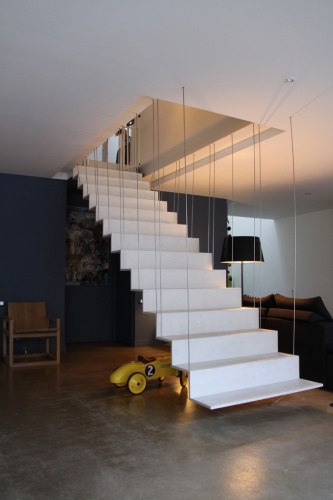Transformation d'un atelier en loft  Toulouse : loft snaky escalier en beton ductal 1